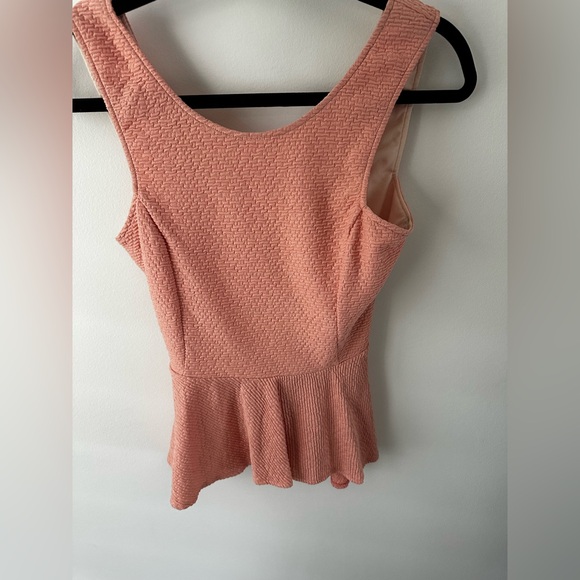 REVOLVE Tops - Revolve peplum top. Open back. Never worn.